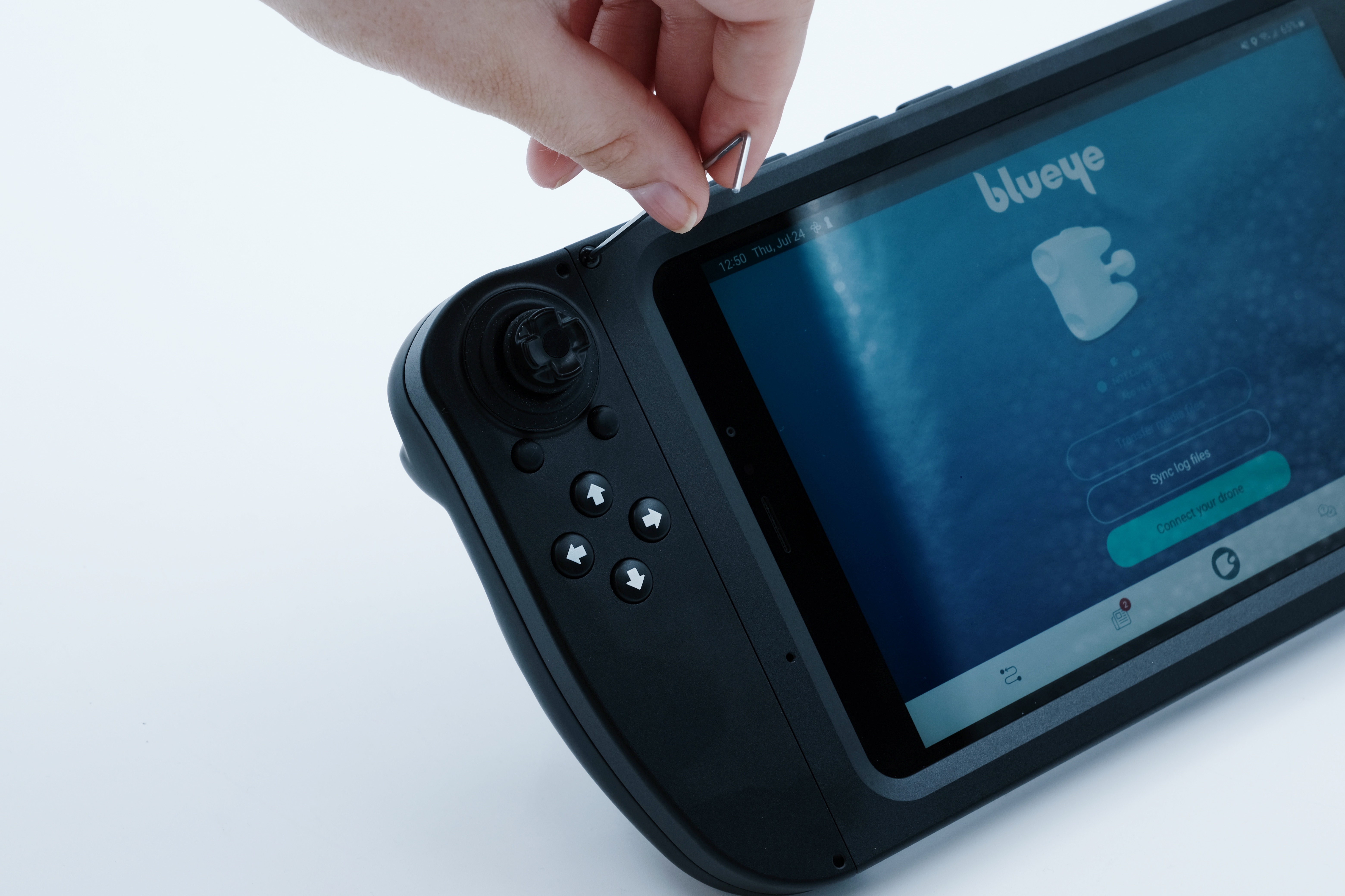 Removal of the tablet from the rugged controller.